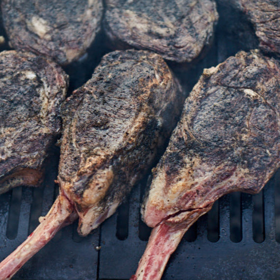 Grilled meat on a grill with a close-up view
